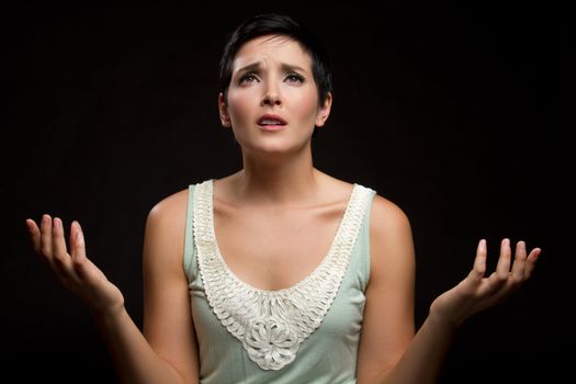 Young sad christian woman praying