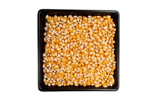Picture of several mais corn og a black plate