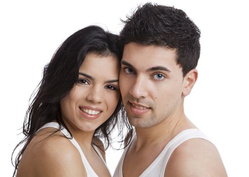 Beautiful and attractive young couple standing over a white background