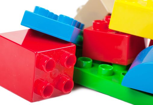 Plastic building blocks isolated on white background