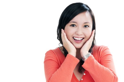 Portrait of a beautiful young woman looking surprised over white background.