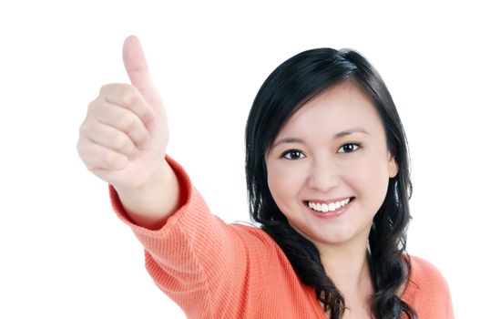Portrait of a beautiful woman giving thumb up sign, over white background.