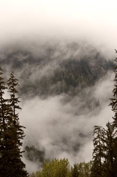Low clouds over mountain slopes