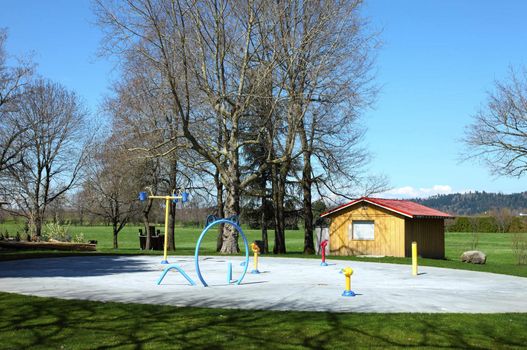 A quite water playground on a first day of spring in Fairview Blue lake park Oregon.