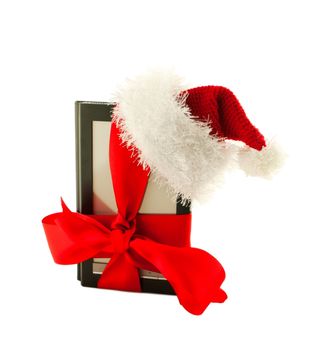 Electronic book reader wearing Santa's hat