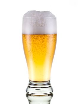 Fresh beer with froth, isolated on white