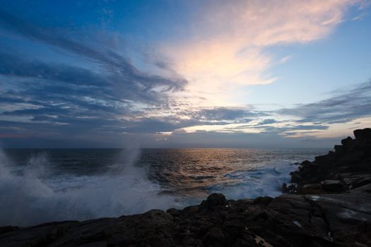 Rocky coast at sunset. Unawatuna, Sri Lanka