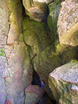A narrow corridor through giant rocks at Maquoketa Caves in Iowa.