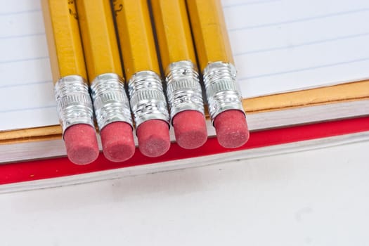 Closup of pencils looking down on a white background.