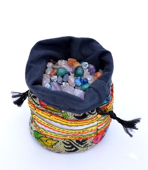 Sack of crystal beads, various colors, isolated on white