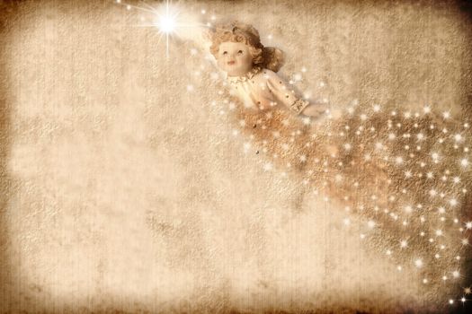 Old Christmas background in sepia tone, angel and stars