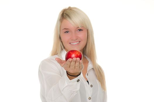 Young girl is giving an apple away. Over white background