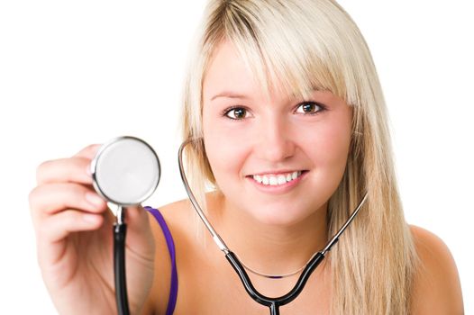 Young beautiful smiling girl with stethoscope. Over white background