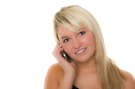 Young beautiful girl with smartphone smiling. Over white background