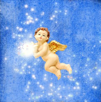 Angel with a star on their hands on a blue background