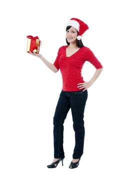 Portrait of an attractive Christmas woman holding a gift box against white background