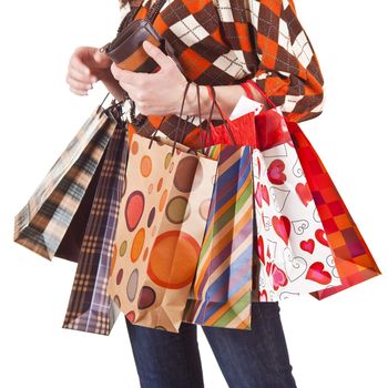 Shoppers Happiness - Woman's hand with shopping bags