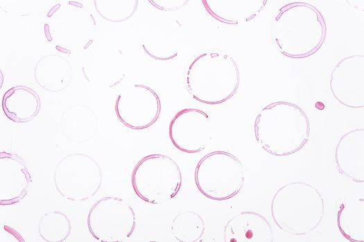 close up of wine glass marks on white background 