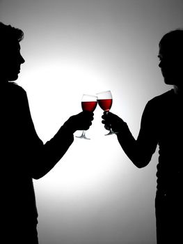 Couple drinking red vine