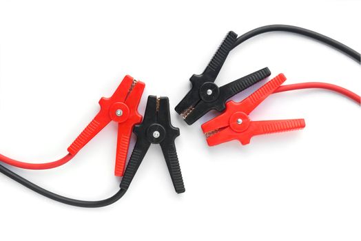 Car battery jumper cables over white background