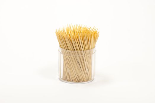 Wood toothpicks on a white background 
