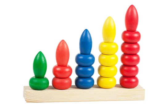 Colorful developmental toy with building blocks isolated over white