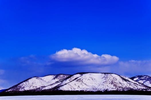 Hill in snow on Kamchatka in Russia
