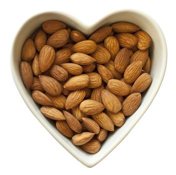 Heart shaped bowl filled with healthy almonds