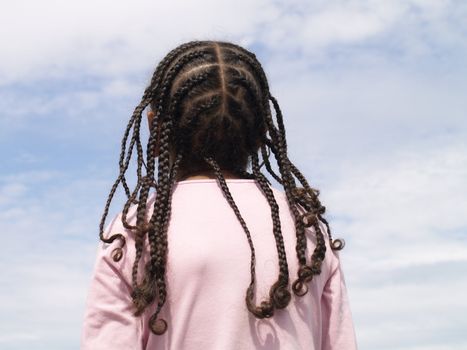 girl with rasta from behind