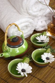 Aromatherapy, relaxing herbal tea and soft cotton towels in a spa