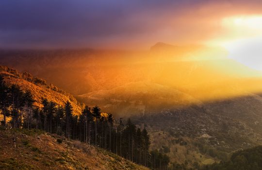 Mountainous landscape with dramatic morning light