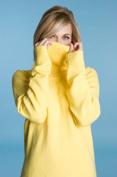 Pretty girl wearing yellow sweater