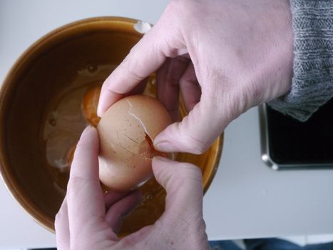 eggs in a bowl on a wooden background