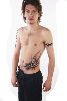 Man with tattoos posing