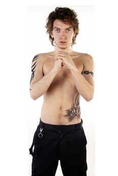 Man with tattoos posing