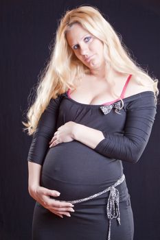 Future mother - Pregnant woman holding tummy