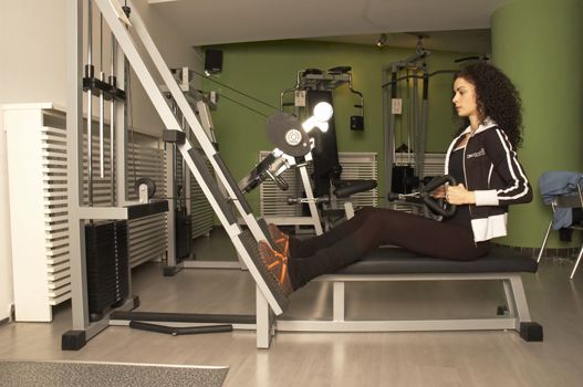 Woman practices and resting in Gym