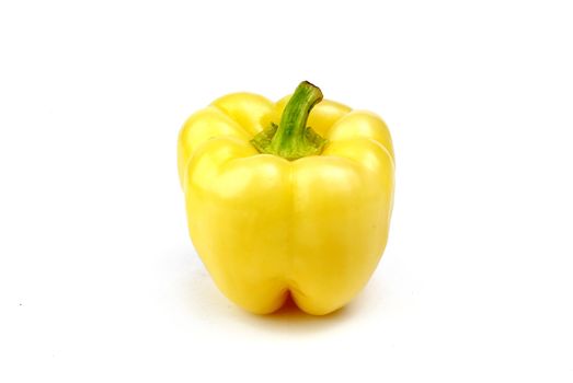 One yellow pepper isolated on white