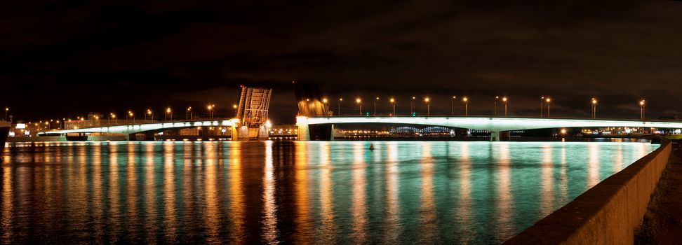 Night panorama of the dissolved bridge of Alexander Nevsky in St.-Petersburg

