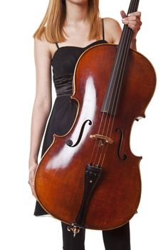 Woman in black dress holding violoncello in hand
