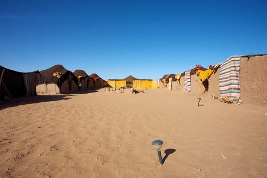 Traditional berber camp site in the Sahara desert dunes of Merzouga in Morocco