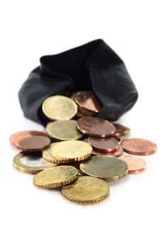 a black purse filled with euro coins