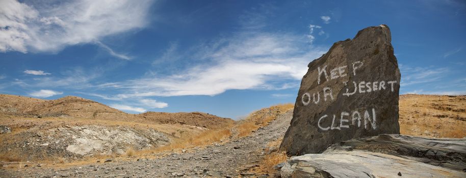 Signs on rocks in the middle of the desert in Namibia