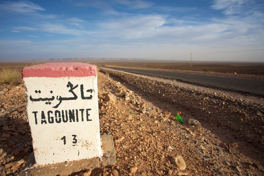 Road Sign to Tagounite in Morocco with blue sky