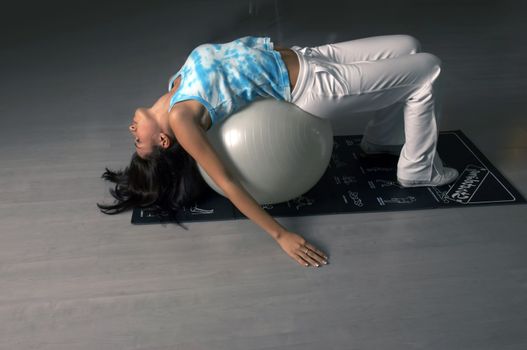 Woman practices and resting in Gym