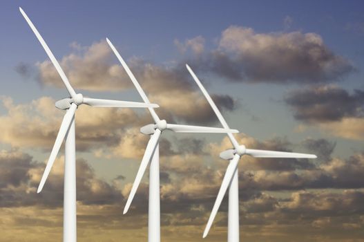 Three Wind Turbines Over Dramatic Blue Sky and Clouds.