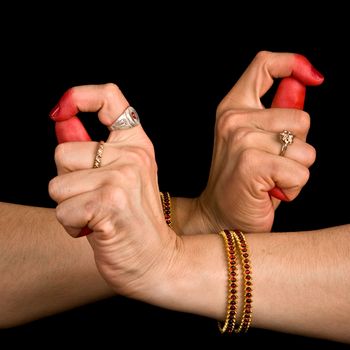 Women hands showing Bherunda hasta of indian classic dance Bharata Natyam