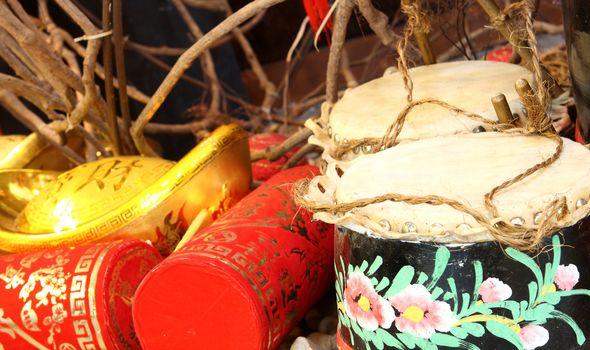 Firecrackers and a Chinese Traditional Wooden Drum 