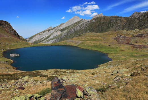 Image of the lake d'Anglas (2068m) located in the Atlantique-Pyrenees mountains above the famous sky station Gourette in south of France.