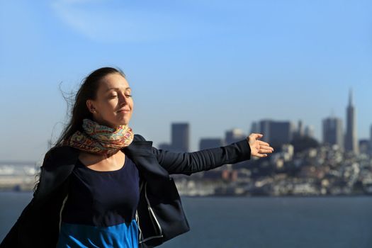 The beautiful girl on a background of San Francisco